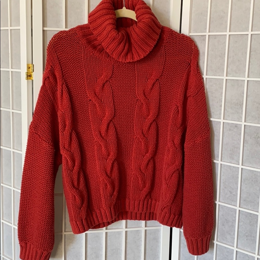 Red turtleneck sweater